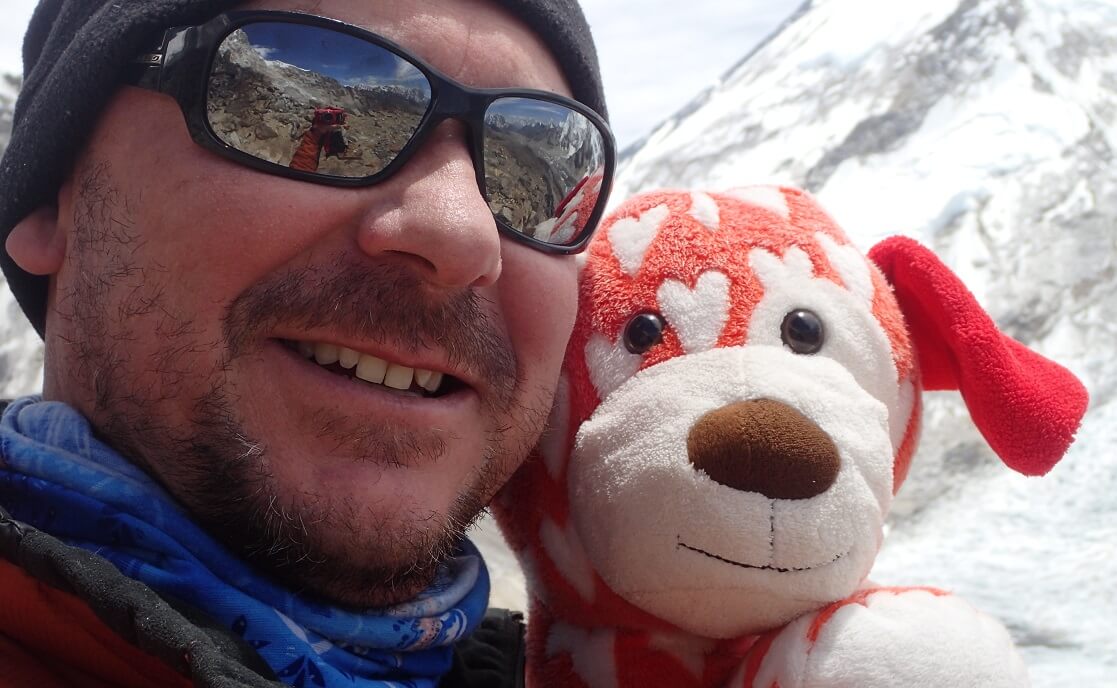 Hugo Searle, High Adventure Expeditions Leader, and HeartDog on Mount Everest